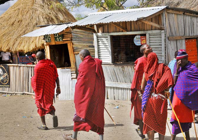 bigstock-Masai-walking-through-the-Arus-41323903