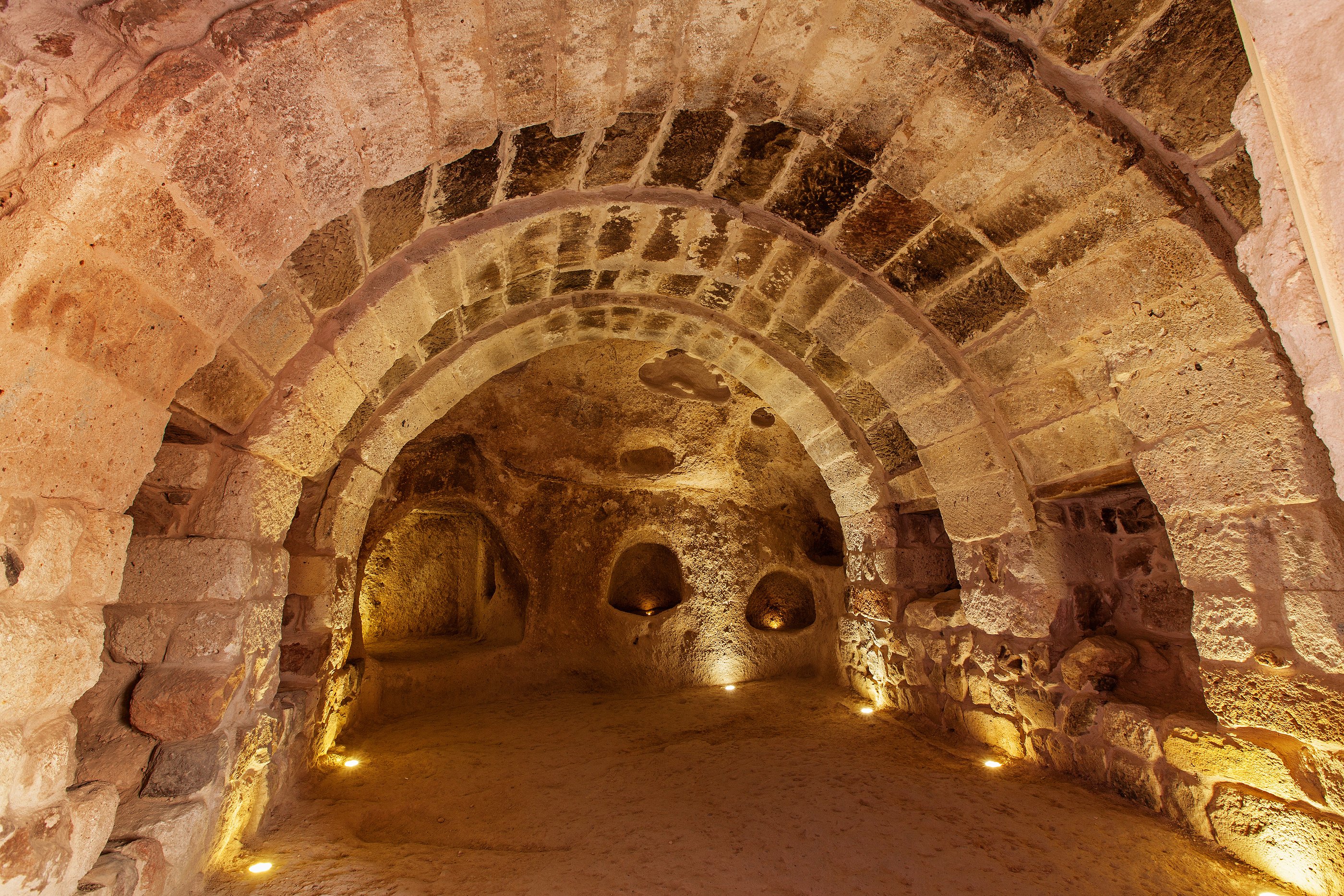 bigstock-The-Uchisar-Underground-City-I-242208220
